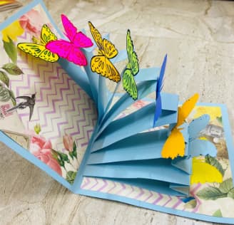 Surprise message wrapped in DIY pop-up card DIY pop-up card with a surprise message inside