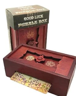 Secret note inside a puzzle box to unlock Puzzle box that needs unlocking to reveal secret inside