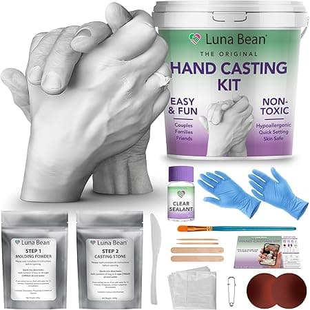 DIY hand casting kit with molding powder, casting stone, and sculpting tools for creating hand molds