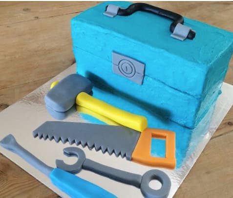 Wrapped surprise message inside DIY toolbox DIY toolbox with wrapped surprise message inside