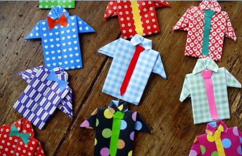 Hidden note folded into origami shirt Origami shirt made from folded paper with hidden note