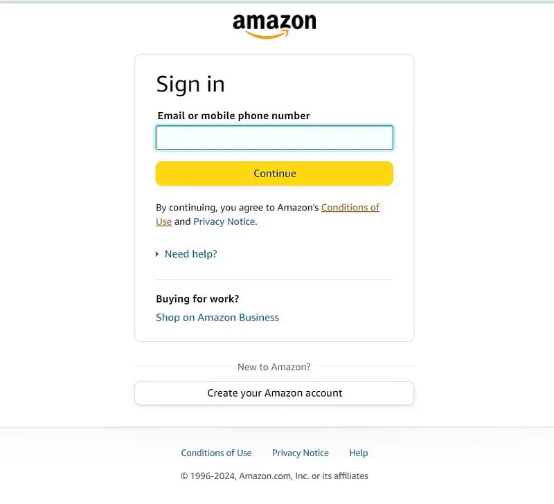 Amazon login page showing user entering account credentials to access payment settings and gift card balance options