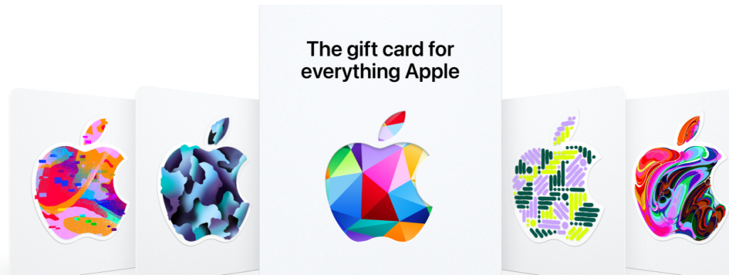 A user visiting the official Apple website on a laptop or smartphone, preparing to redeem their gift card through the homepage navigation menu