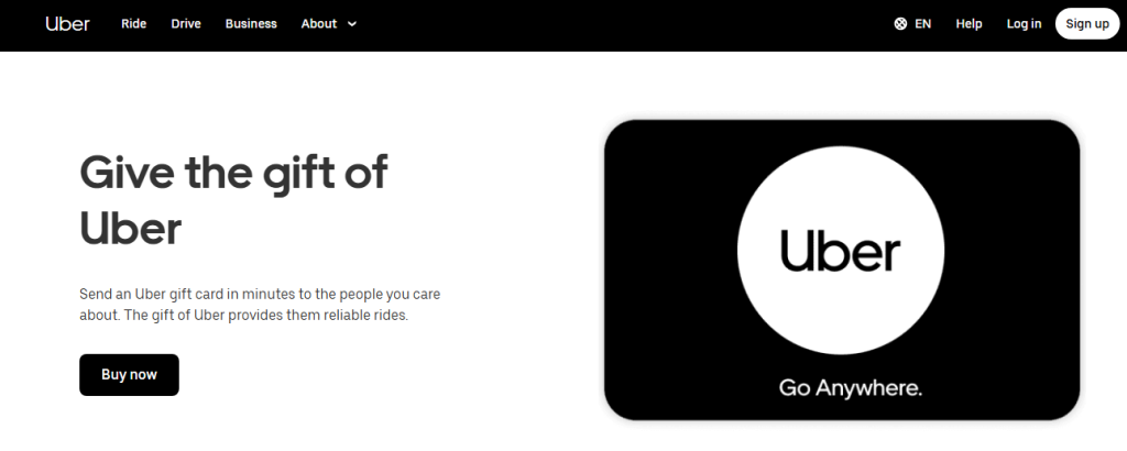 User opening the official Uber mobile app on a smartphone and visiting the Uber website homepage on a laptop screen. User opening the official Uber mobile app on a smartphone and visiting the Uber website homepage on a laptop screen.