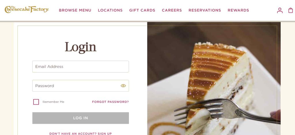 A person logging into their Cheesecake Factory account on a desktop screen, with a visible login form or 'Create Account' option highlighted A person logging into their Cheesecake Factory account on a desktop screen, with a visible login form or 'Create Account' option highlighted