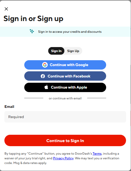 User logging into DoorDash account or signing up with email on the DoorDash mobile app screen User logging into DoorDash account or signing up with email on the DoorDash mobile app screen