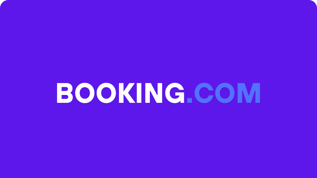 A digital Booking.com gift card placed beside a passport, travel map, and suitcase, symbolizing flexible hotel and flight bookings A digital Booking.com gift card placed beside a passport, travel map, and suitcase, symbolizing flexible hotel and flight bookings
