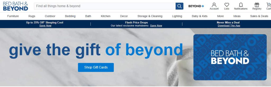 User accessing the official Bed Bath & Beyond website on a laptop or smartphone to begin the gift card redemption process. User accessing the official Bed Bath & Beyond website on a laptop or smartphone to begin the gift card redemption process.
